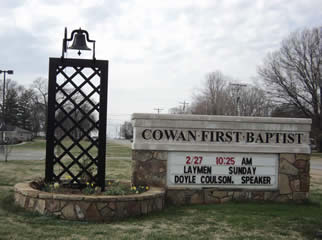 Historic bell in front of Cowan First Baptist Church.